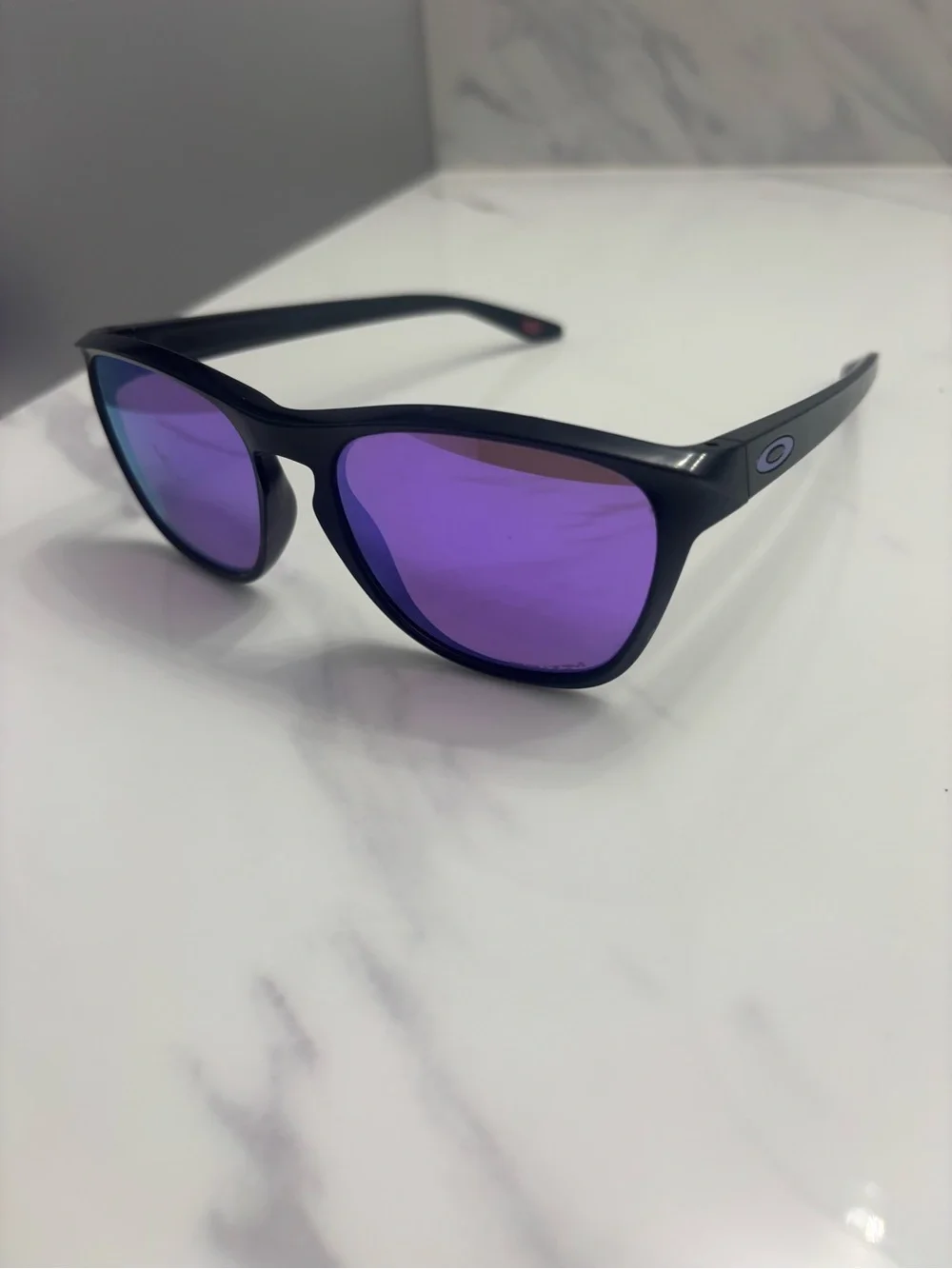 Oakley Black Frame Sunglasses with Purple Mirrored Lenses